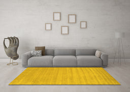 Machine Washable Solid Yellow Modern Rug in a Living Room, wshcon110yw