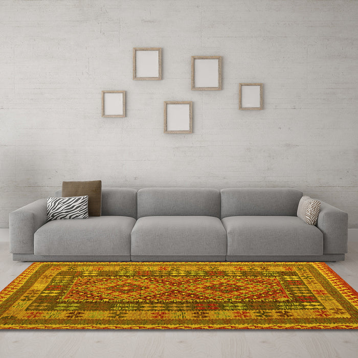 Machine Washable Oriental Yellow Traditional Rug in a Living Room, wshcon1114yw