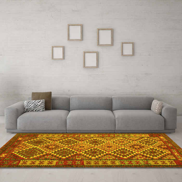 Machine Washable Oriental Yellow Traditional Rug in a Living Room, wshcon1124yw