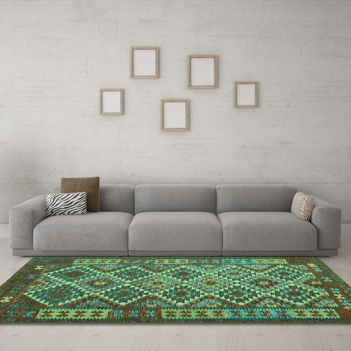 Machine Washable Oriental Turquoise Traditional Area Rugs in a Living Room,, wshcon1124turq