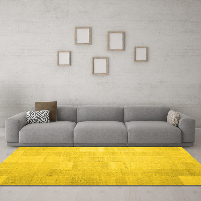 Machine Washable Solid Yellow Modern Rug in a Living Room, wshcon1128yw
