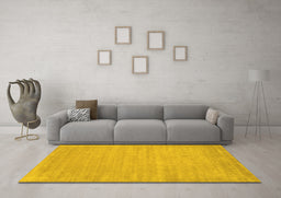 Machine Washable Solid Yellow Modern Rug in a Living Room, wshcon112yw