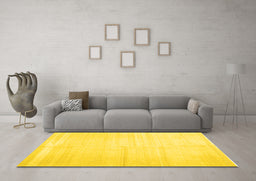 Machine Washable Solid Yellow Modern Rug in a Living Room, wshcon1137yw