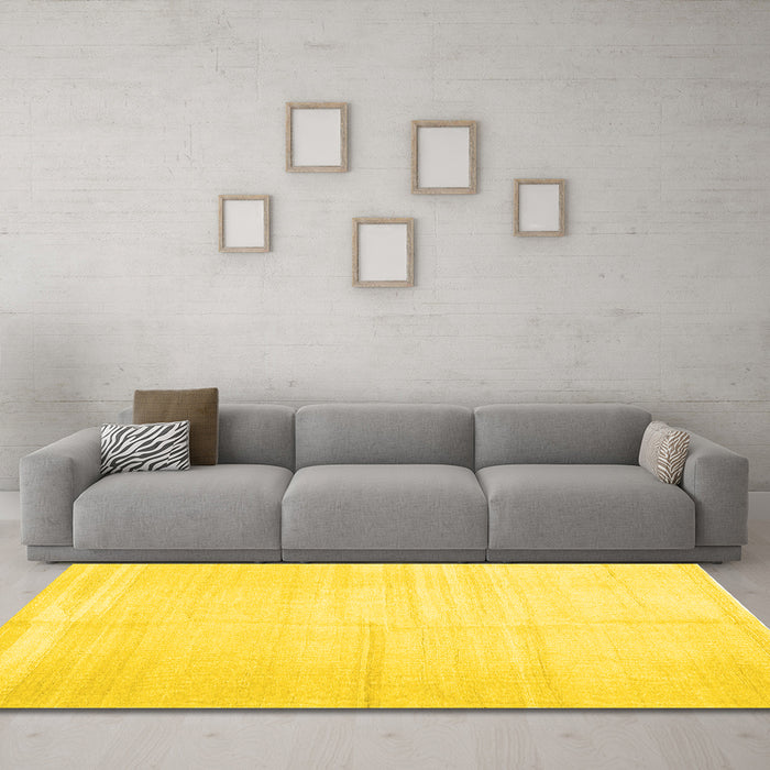 Machine Washable Solid Yellow Modern Rug in a Living Room, wshcon1137yw