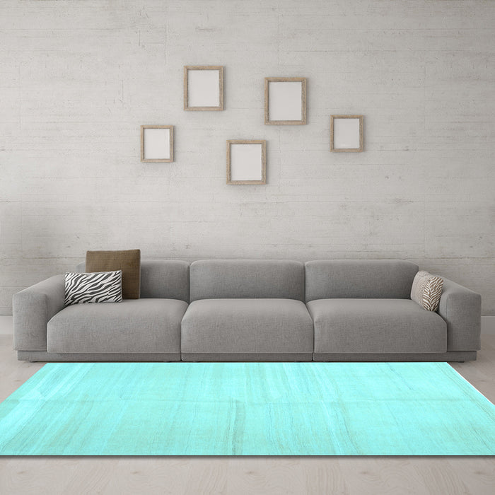 Machine Washable Solid Light Blue Modern Rug in a Living Room, wshcon1137lblu