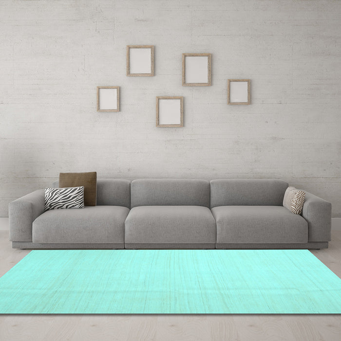Machine Washable Solid Light Blue Modern Rug in a Living Room, wshcon1140lblu