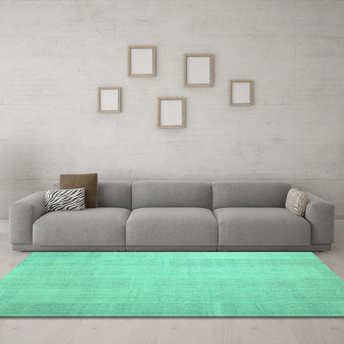 Machine Washable Solid Turquoise Modern Area Rugs in a Living Room,, wshcon1158turq
