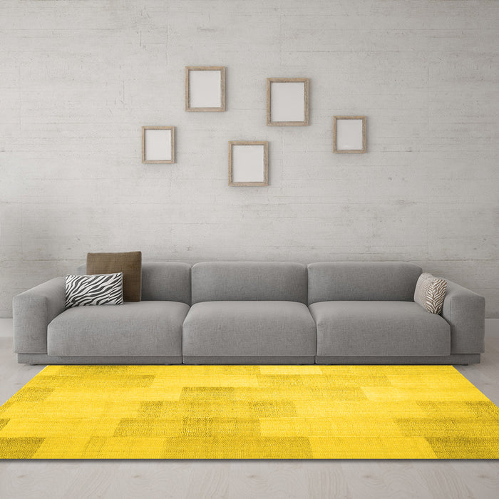 Machine Washable Solid Yellow Modern Rug in a Living Room, wshcon1159yw