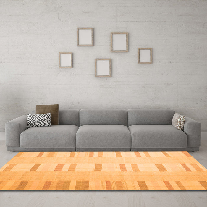 Machine Washable Solid Orange Modern Area Rugs in a Living Room, wshcon1160org