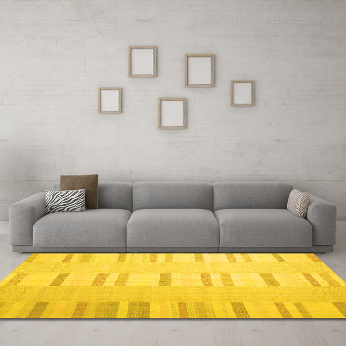 Machine Washable Solid Yellow Modern Rug in a Living Room, wshcon1160yw