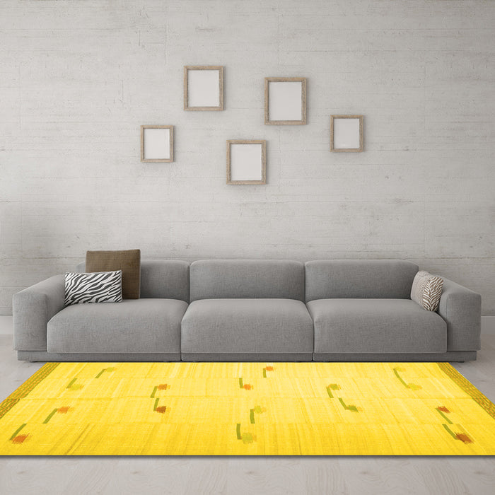 Machine Washable Solid Yellow Modern Rug in a Living Room, wshcon1171yw