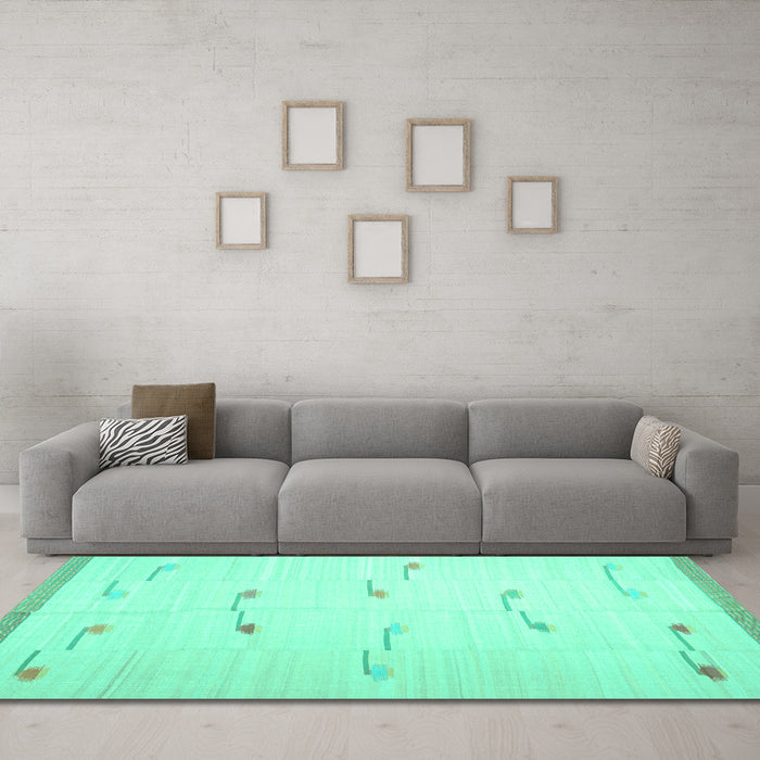 Machine Washable Solid Turquoise Modern Area Rugs in a Living Room,, wshcon1171turq