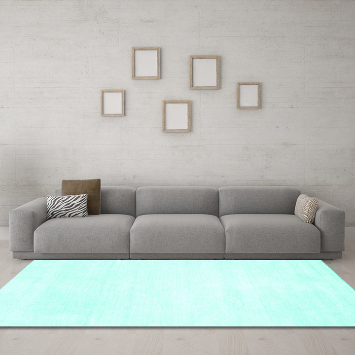 Machine Washable Solid Turquoise Modern Area Rugs in a Living Room,, wshcon117turq