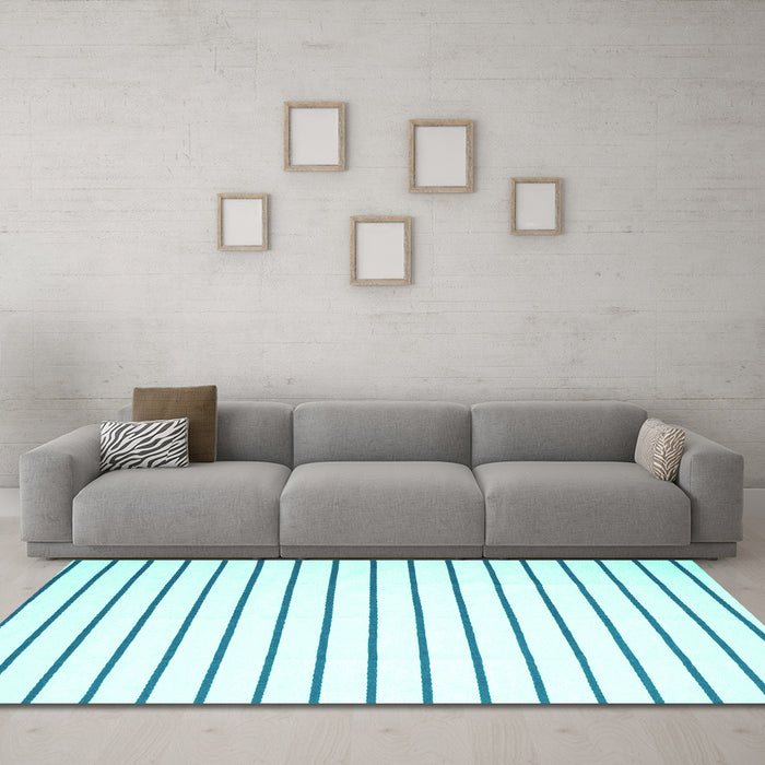 Machine Washable Solid Turquoise Modern Area Rugs in a Living Room,, wshcon1180turq