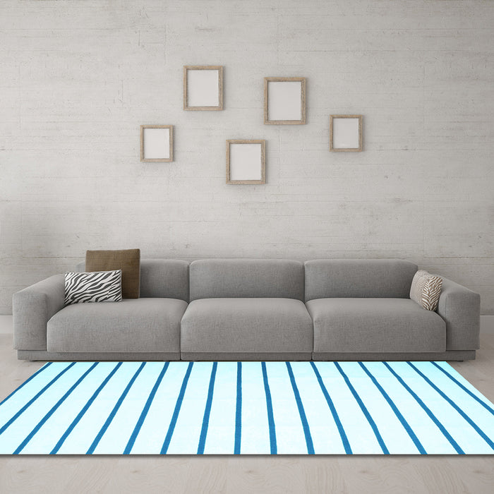 Machine Washable Solid Light Blue Modern Rug in a Living Room, wshcon1182lblu