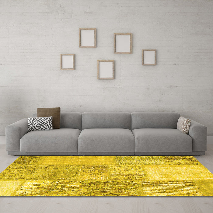 Machine Washable Patchwork Yellow Transitional Rug in a Living Room, wshcon1190yw
