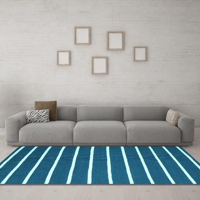 Machine Washable Abstract Turquoise Contemporary Area Rugs in a Living Room,, wshcon1199turq