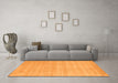 Machine Washable Solid Orange Modern Area Rugs in a Living Room, wshcon120org