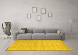 Machine Washable Solid Yellow Modern Rug in a Living Room, wshcon120yw