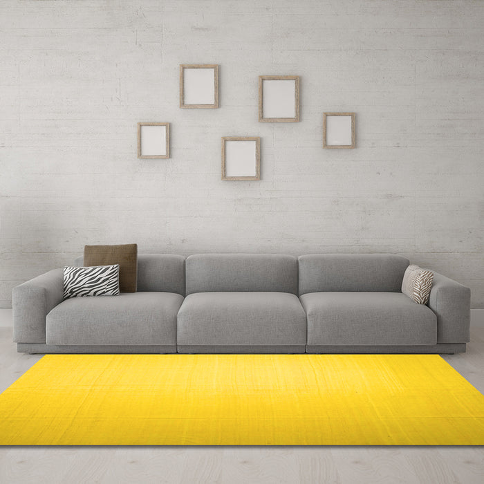 Machine Washable Solid Yellow Modern Rug in a Living Room, wshcon1251yw