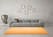 Machine Washable Solid Orange Modern Area Rugs in a Living Room, wshcon1251org