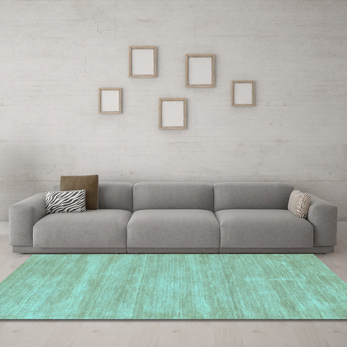 Machine Washable Solid Light Blue Modern Rug in a Living Room, wshcon125lblu