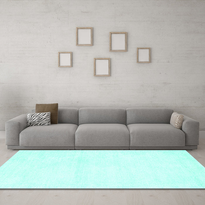 Machine Washable Solid Turquoise Modern Area Rugs in a Living Room,, wshcon127turq