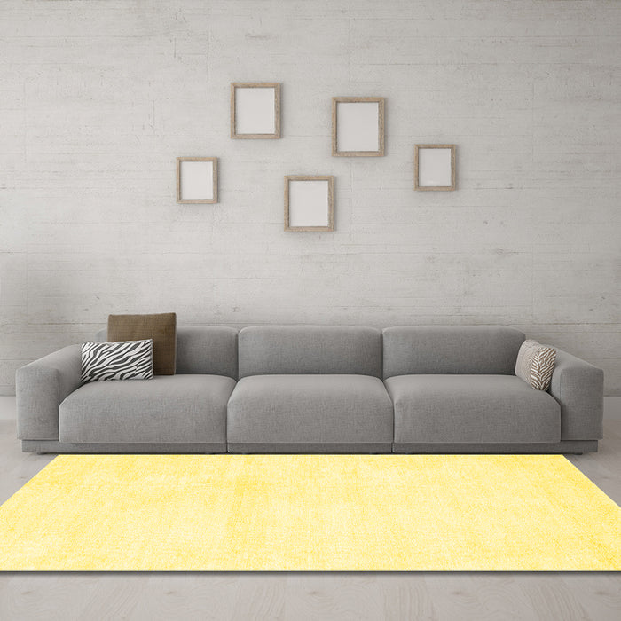 Machine Washable Solid Yellow Modern Rug in a Living Room, wshcon127yw