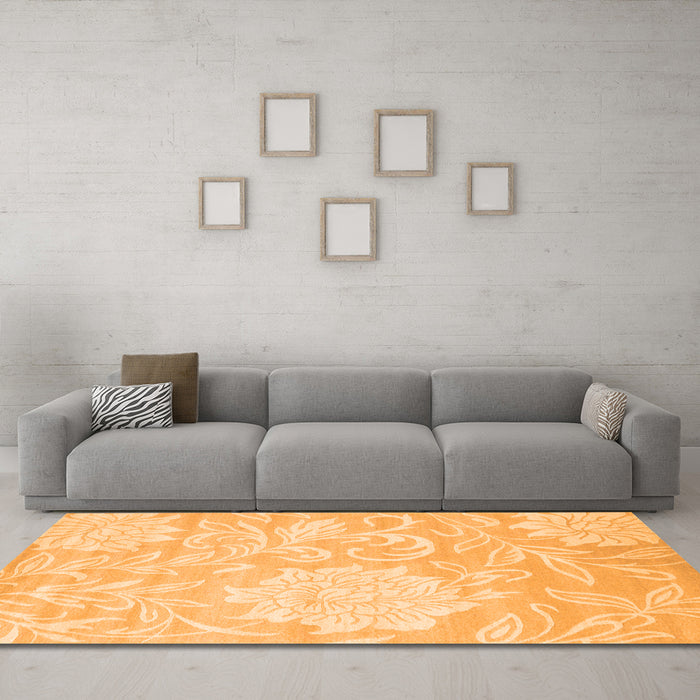 Machine Washable Solid Orange Modern Area Rugs in a Living Room, wshcon1285org