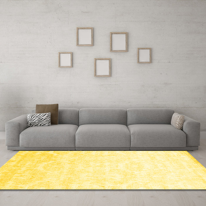 Machine Washable Solid Yellow Modern Rug in a Living Room, wshcon1289yw