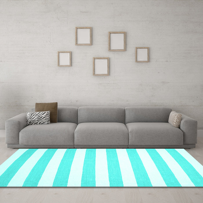 Machine Washable Solid Turquoise Modern Area Rugs in a Living Room,, wshcon12turq