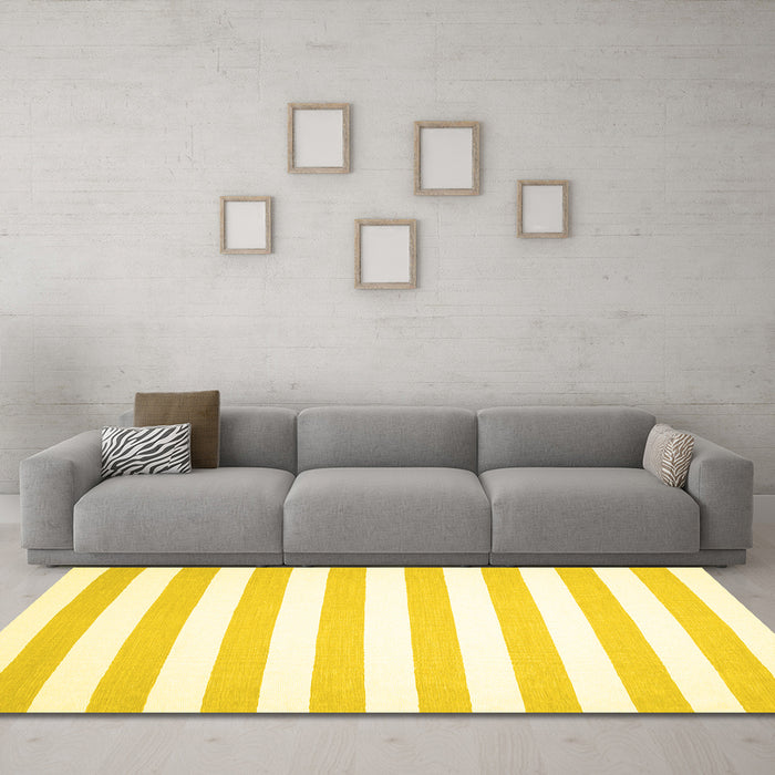 Machine Washable Solid Yellow Modern Rug in a Living Room, wshcon12yw