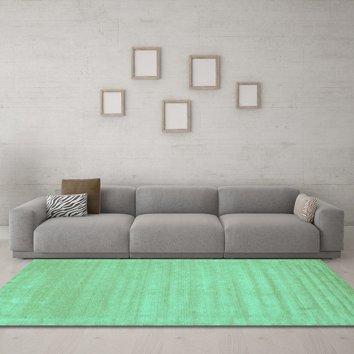 Machine Washable Solid Turquoise Modern Area Rugs in a Living Room,, wshcon131turq