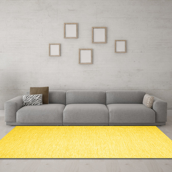 Machine Washable Solid Yellow Modern Rug in a Living Room, wshcon1370yw