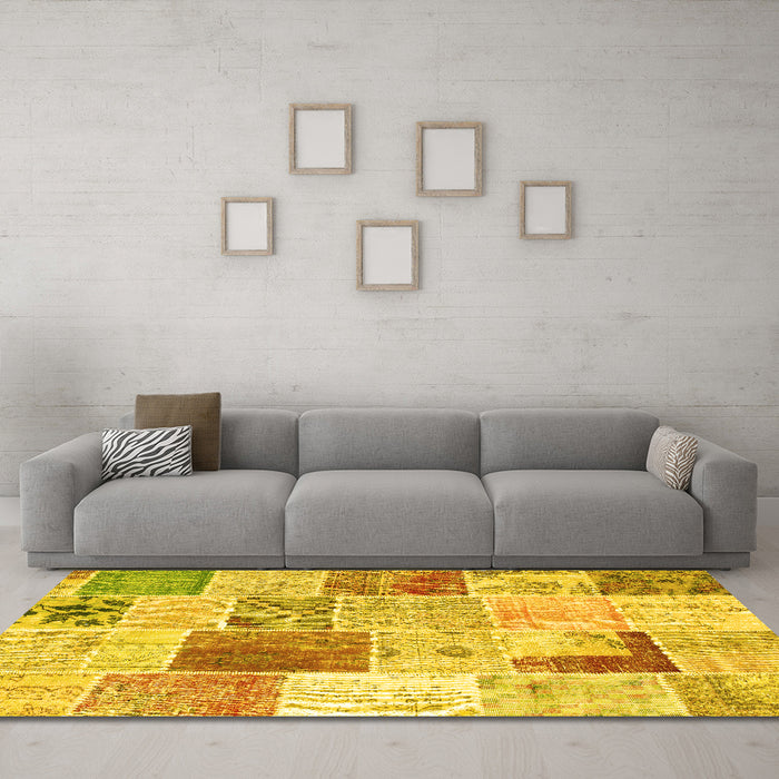 Machine Washable Patchwork Yellow Transitional Rug in a Living Room, wshcon1380yw