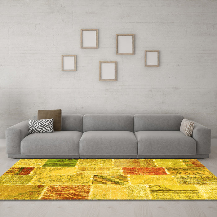Machine Washable Patchwork Yellow Transitional Rug in a Living Room, wshcon1382yw