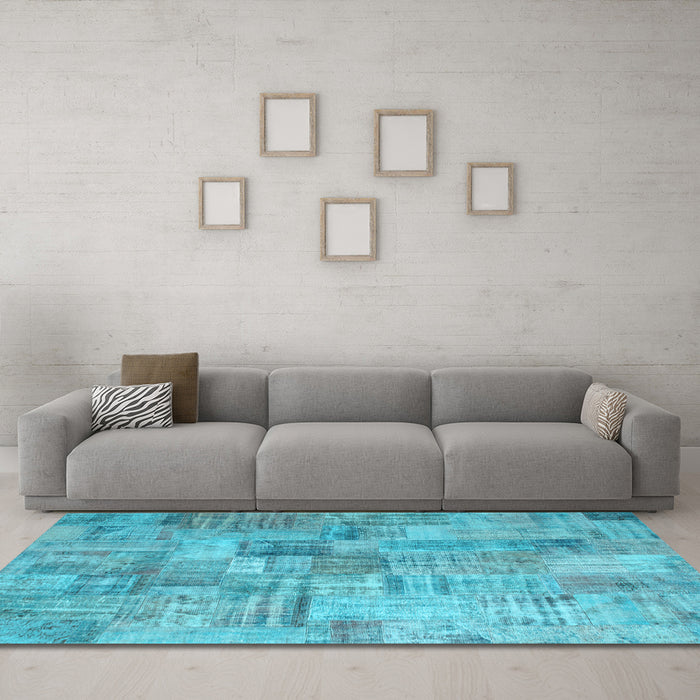 Machine Washable Patchwork Light Blue Transitional Rug in a Living Room, wshcon1390lblu