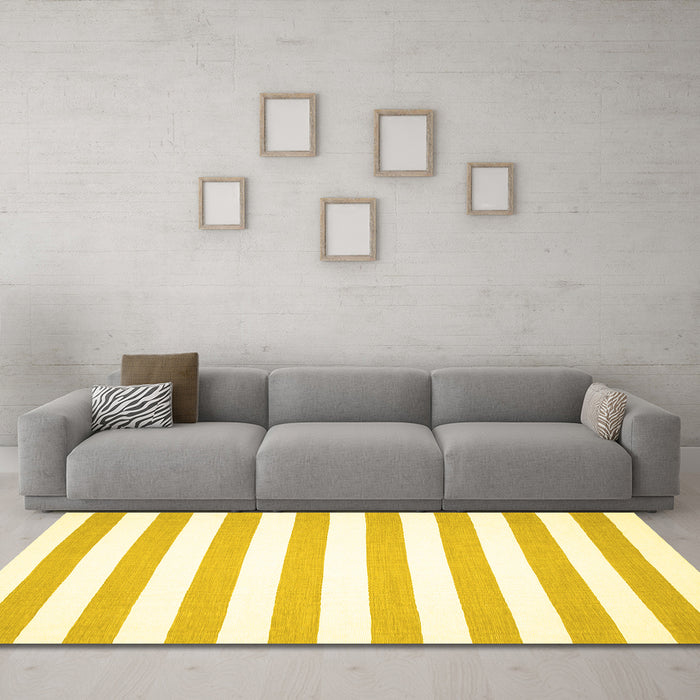 Machine Washable Solid Yellow Modern Rug in a Living Room, wshcon13yw