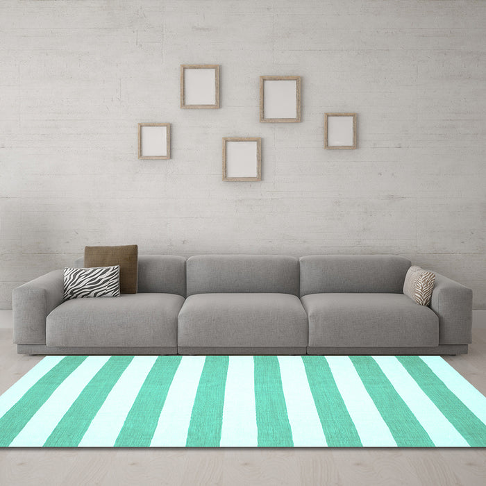 Machine Washable Solid Turquoise Modern Area Rugs in a Living Room,, wshcon13turq