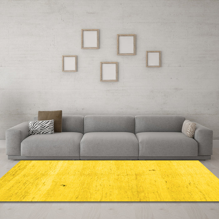 Machine Washable Solid Yellow Modern Rug in a Living Room, wshcon1406yw