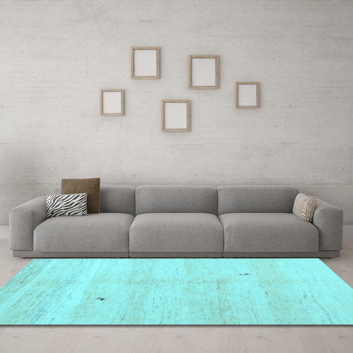 Machine Washable Solid Light Blue Modern Rug in a Living Room, wshcon1406lblu