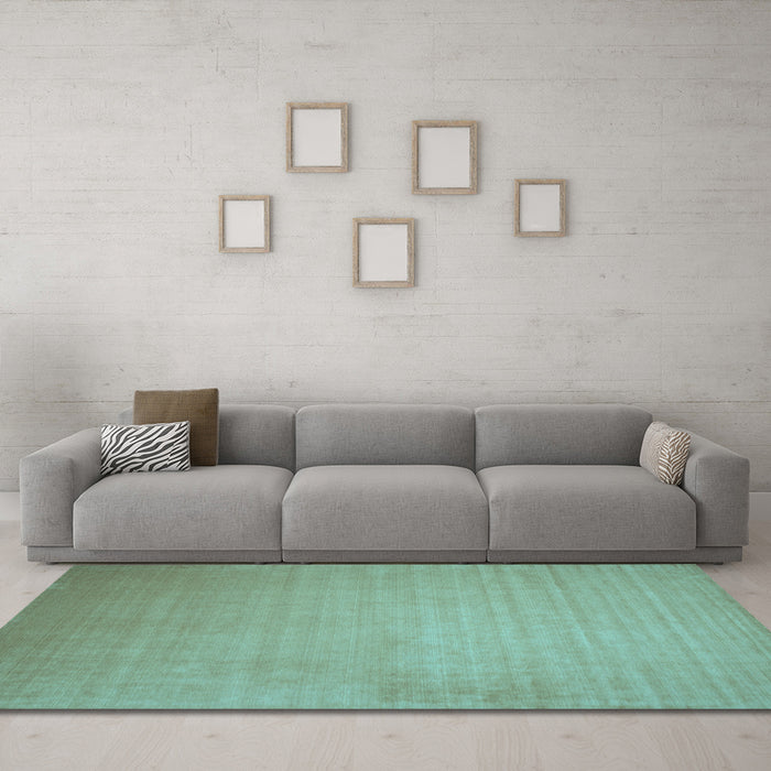 Machine Washable Solid Light Blue Modern Rug in a Living Room, wshcon140lblu