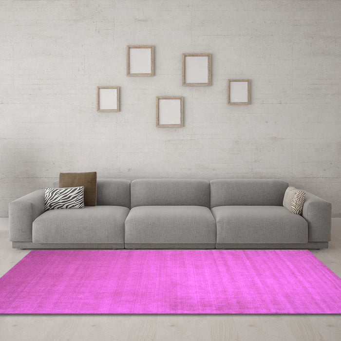 Machine Washable Solid Purple Modern Area Rugs in a Living Room, wshcon140pur