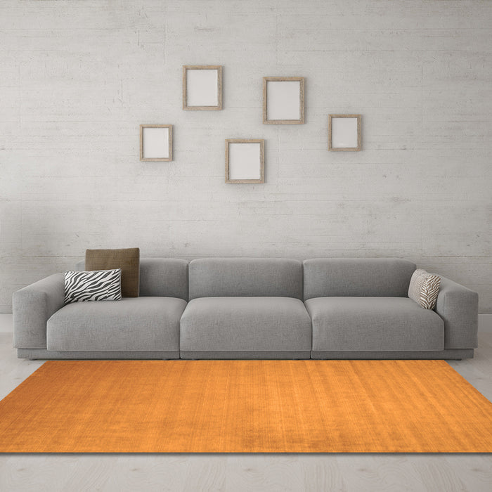 Machine Washable Solid Orange Modern Area Rugs in a Living Room, wshcon140org