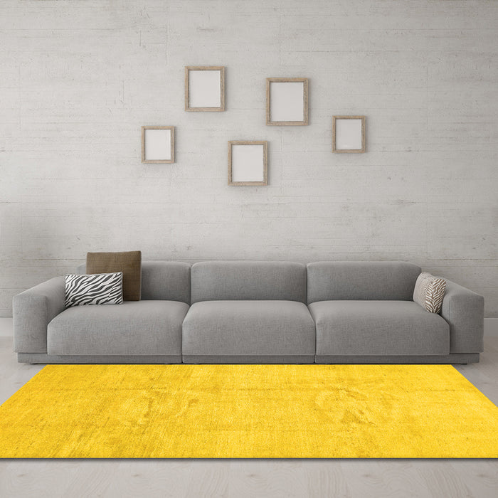 Machine Washable Solid Yellow Modern Rug in a Living Room, wshcon1412yw
