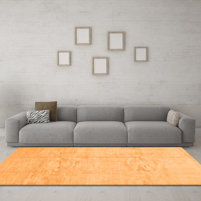 Machine Washable Solid Orange Modern Area Rugs in a Living Room, wshcon1412org