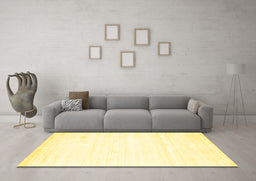 Machine Washable Solid Yellow Modern Rug in a Living Room, wshcon1417yw