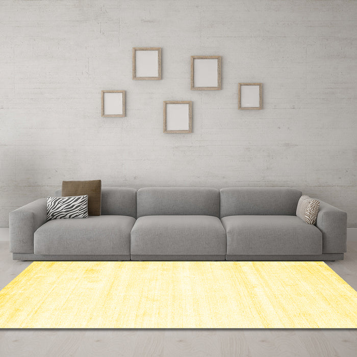 Machine Washable Solid Yellow Modern Rug in a Living Room, wshcon1417yw