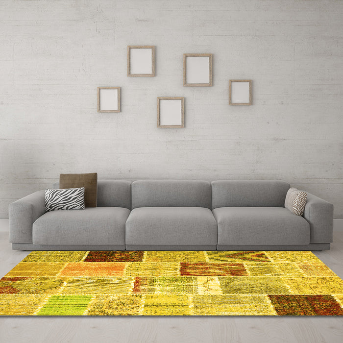 Machine Washable Patchwork Yellow Transitional Rug in a Living Room, wshcon1424yw
