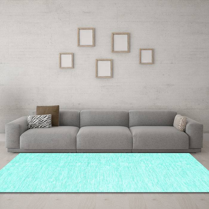 Machine Washable Solid Turquoise Modern Area Rugs in a Living Room,, wshcon1435turq